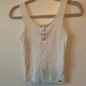 White tank with cross over detail